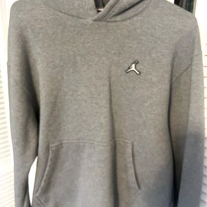 Men’s grey air Jordan hoodie. Good condition signature left sleeve near wrist